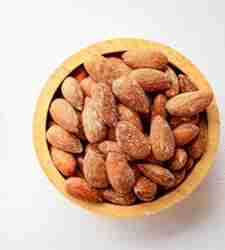 Roasted,Almonds,,Sea,Salt,Roasted,Almonds,In,Wooden,Bowl,On